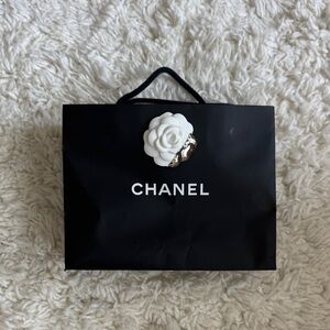 Chanel Black Bag with White Floral Detail